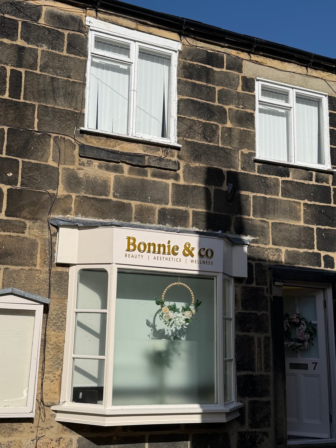 The cream and gold Bonnie and Co shopfront at 7 Bay Horse Court in Otley